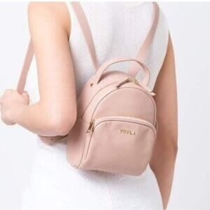 Furla Frida Mini backpack in Moonstone ( pale pink) with Rose Gold hardware New